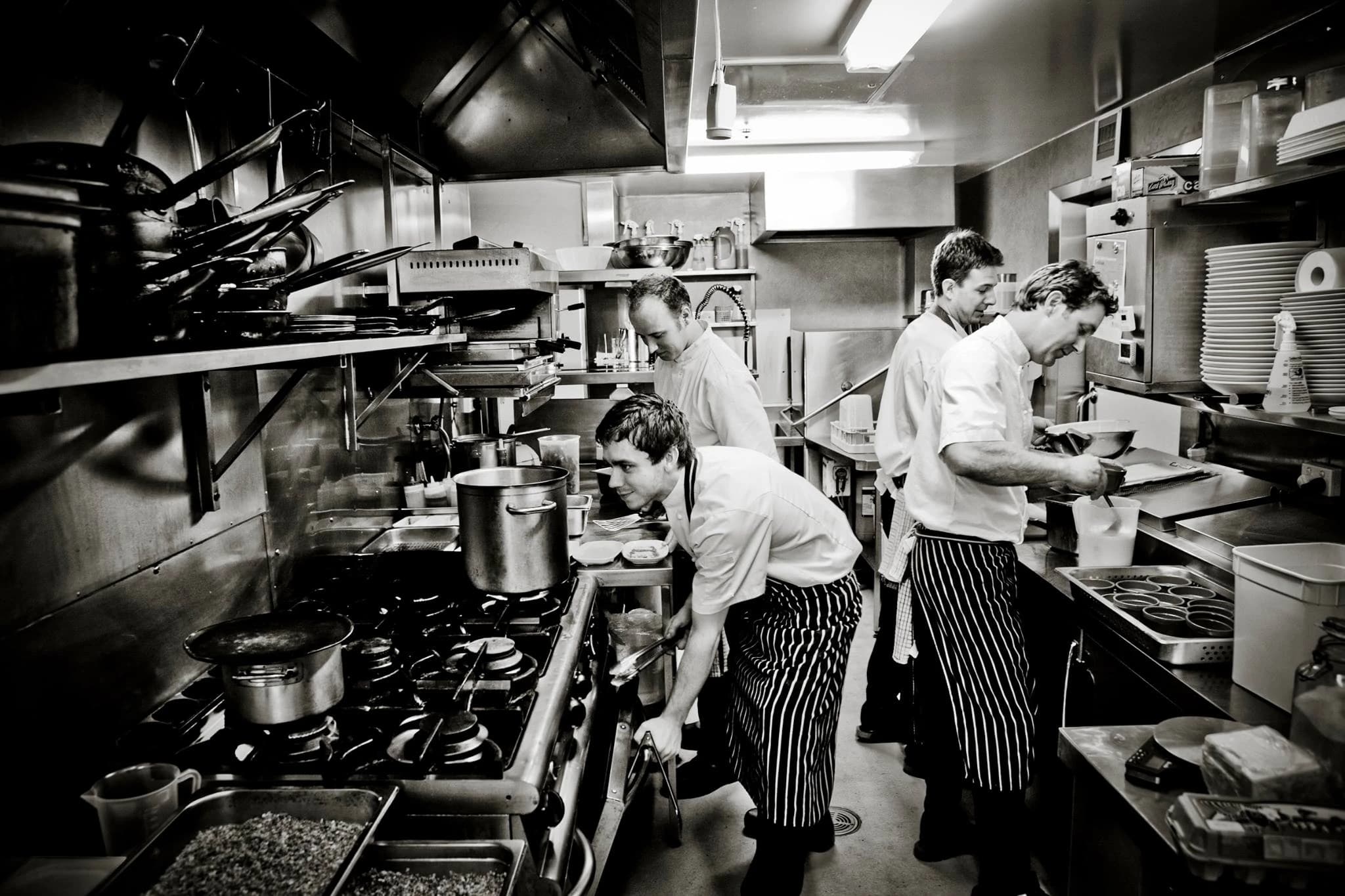 Daniel Olive working as a chef in the kitchen at The Stunned Mullet in Port Macquarie, NSW.